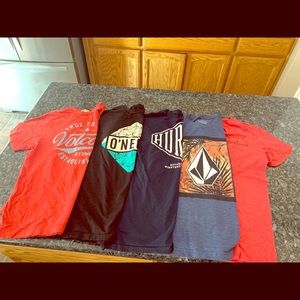 A bundle of 5 large brand name Boys tee shirts